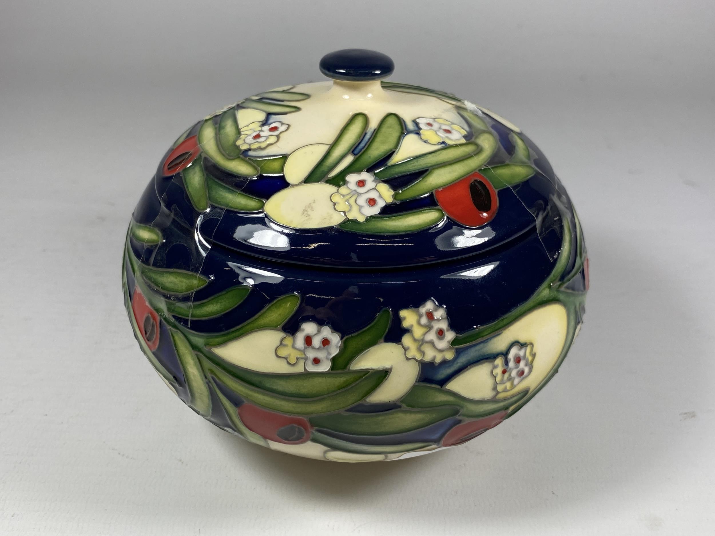 A LIMITED EDITION MOORCROFT POTTERY 'ANKERWYCKE YEW' PATTERN LIDDED VASE, NO. 27/40, R.R.P £545