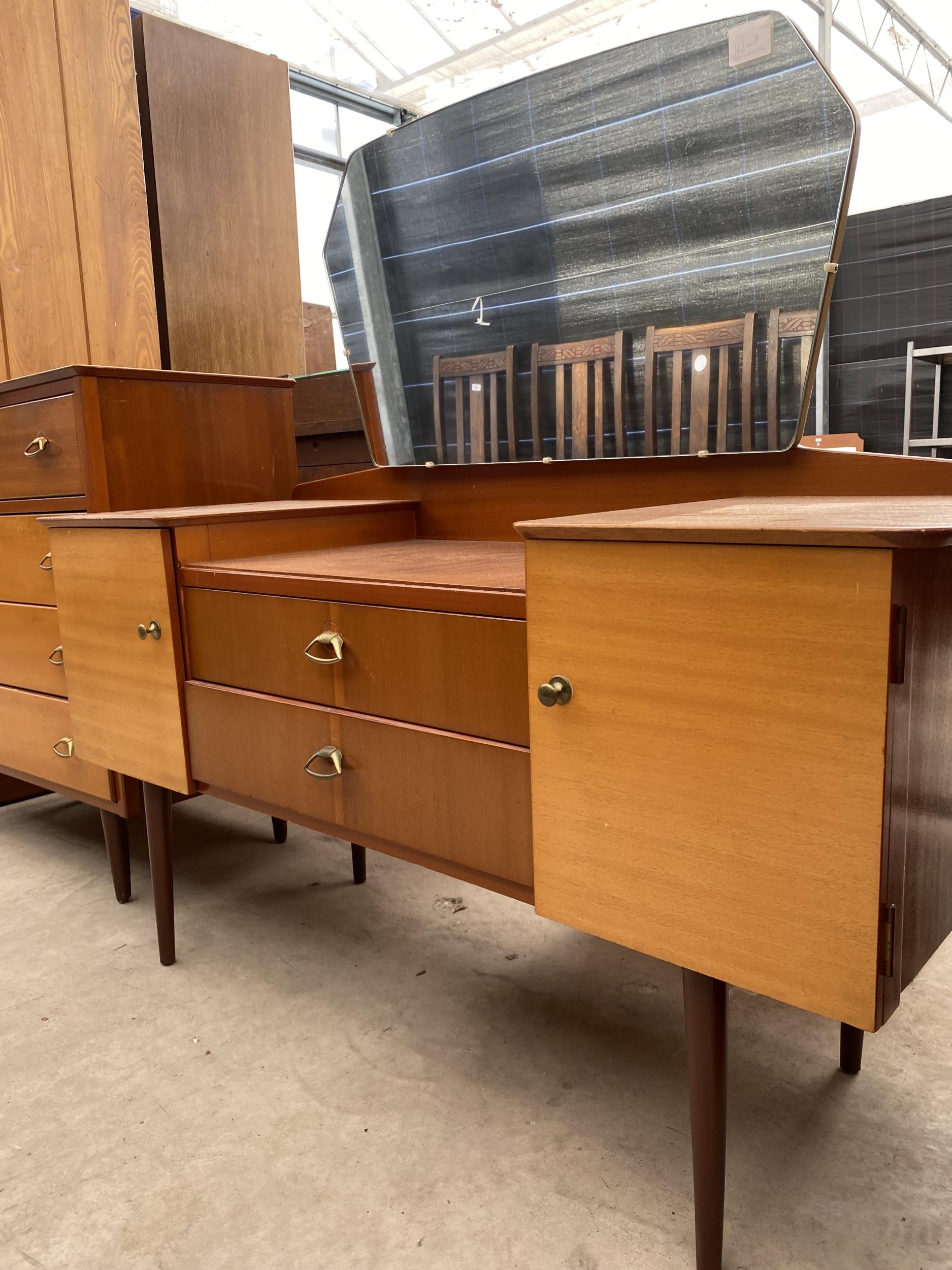 A MID 20TH CENTURY SATINWOOD BEDROOM SUITE COMPRISING A CHEST OF DRAWERS, DRESSING TABLE AND - Image 4 of 5