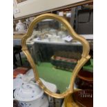 A VINTAGE STYLE SHIELD SHAPED MIRROR WITH GILT FRAME