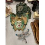 A PORCELAIN BUTTERFLY LADY MASK, LEATHER LADY PLAQUE AND DRAGONFLY HOOK