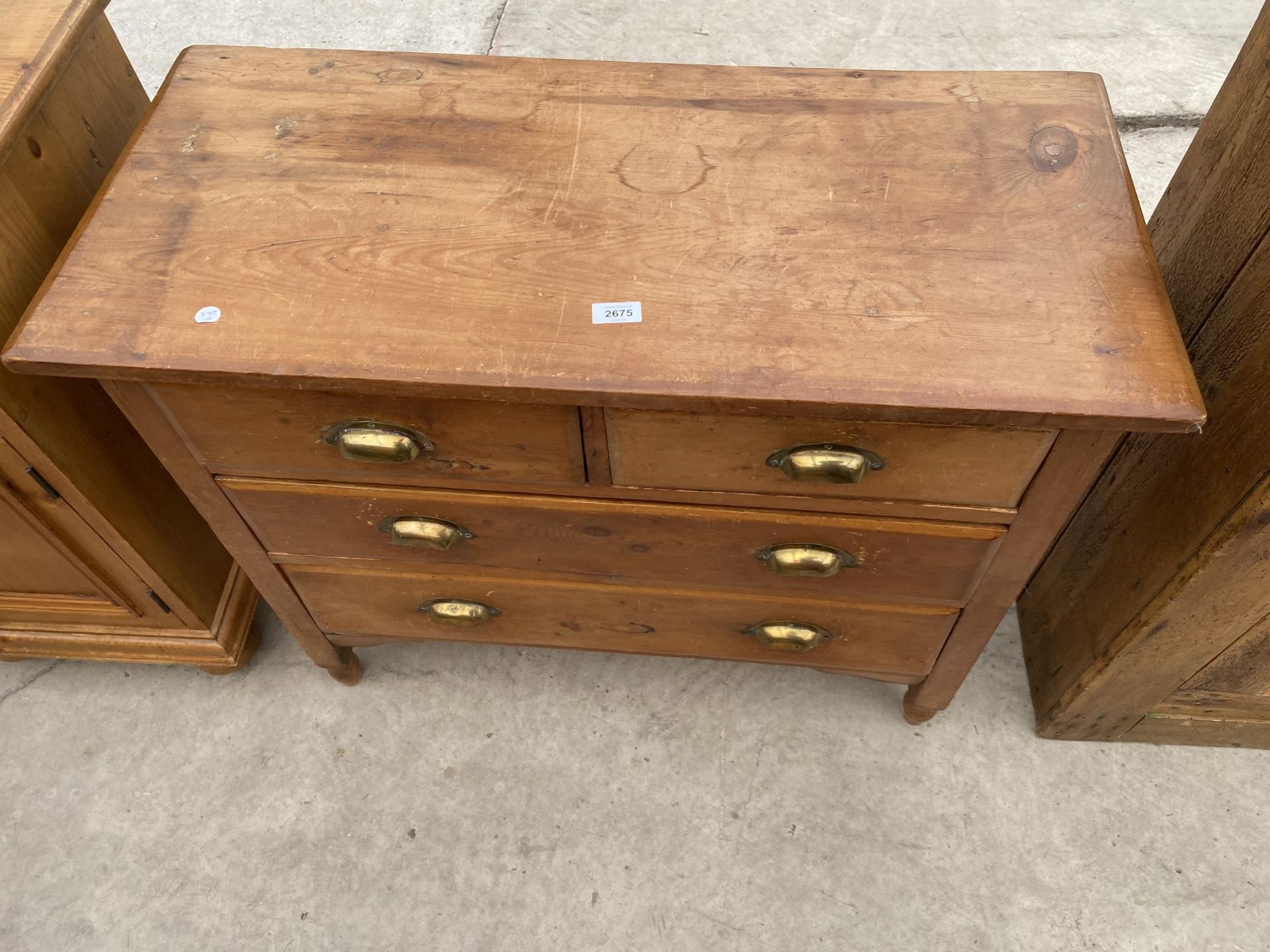 A VICTORIAN PINE CHEST OF TWO SHORT AND TWO LONG DRAWERS WITH BRASS SCOOP HANDLES, 35" WIDE