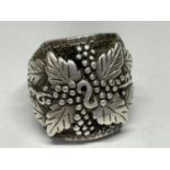 A LARGE SILVER GENTS GRAPE DESIGN RING SIZE T IN A PRESENTATION BOX