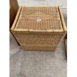 A MODERN WICKER LINEN BOX AND TWO TRAYS