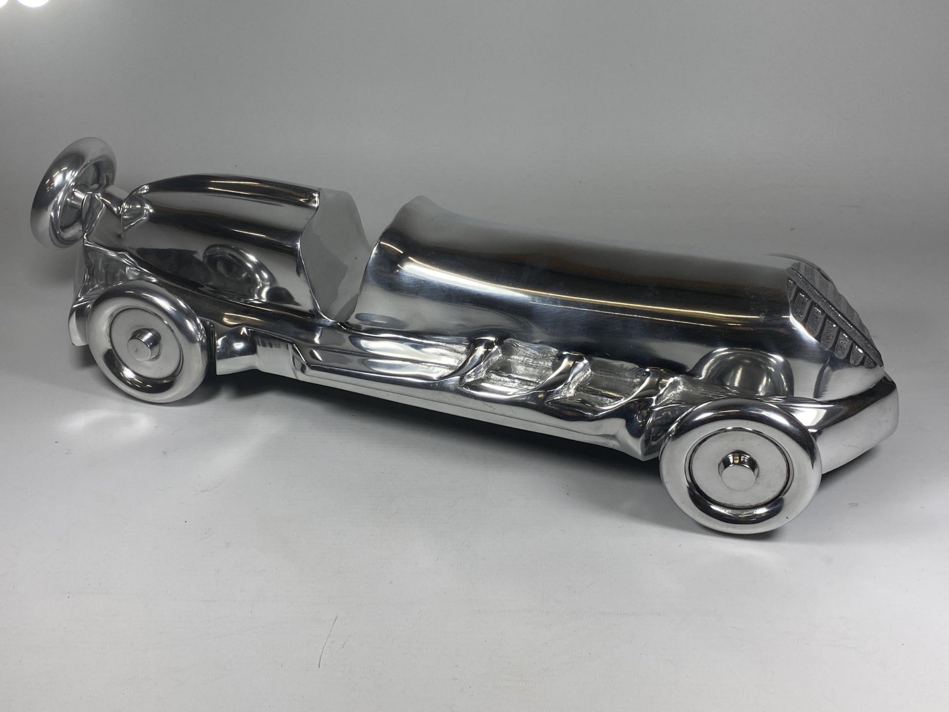 A LARGE ALLOY CHROME STYLE RACING CAR, LENGTH 52CM