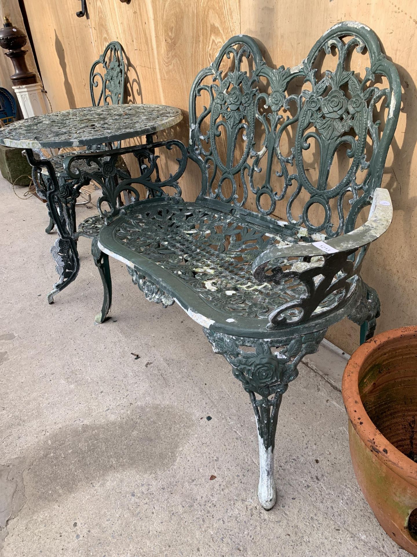 A VINTAGE CAST ALLOY BISTRO SET COMPRISING OF A ROUND TABLE, A BENCH AND A SINGLE CHAIR - Image 2 of 3