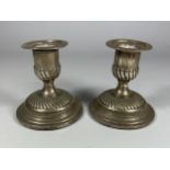 A PAIR OF VICTORIAN HALLMARKED SILVER CANDLESTICKS WITH FLUTED BASE DESIGN, HEIGHT 9CM