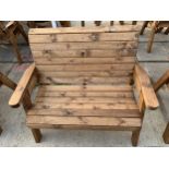 AN EX DISPLAY CHARLES TAYLOR TWO SEATER GARDEN BENCH *PLEASE NOTE VAT TO BE CHARGED ON THIS ITEM*