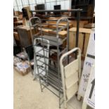 AN ASSORTMENT OF ITEMS TO INCLUDE A SHOE RACK, STEP LADDERS AND A CLOTHES RAIL ETC