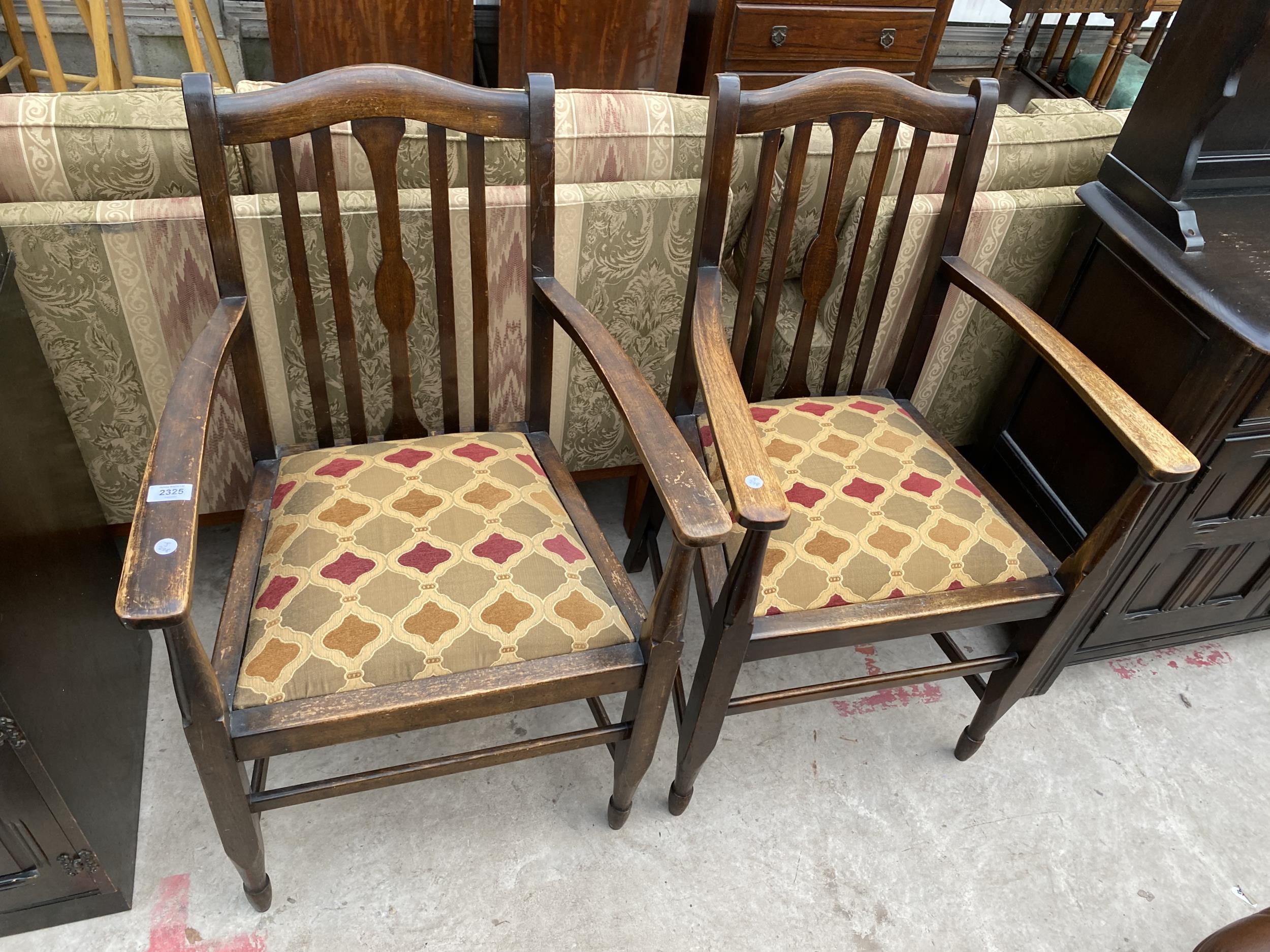 A PAIR OF MID 20TH CENTURY BEECH ELBOW CHAIRS