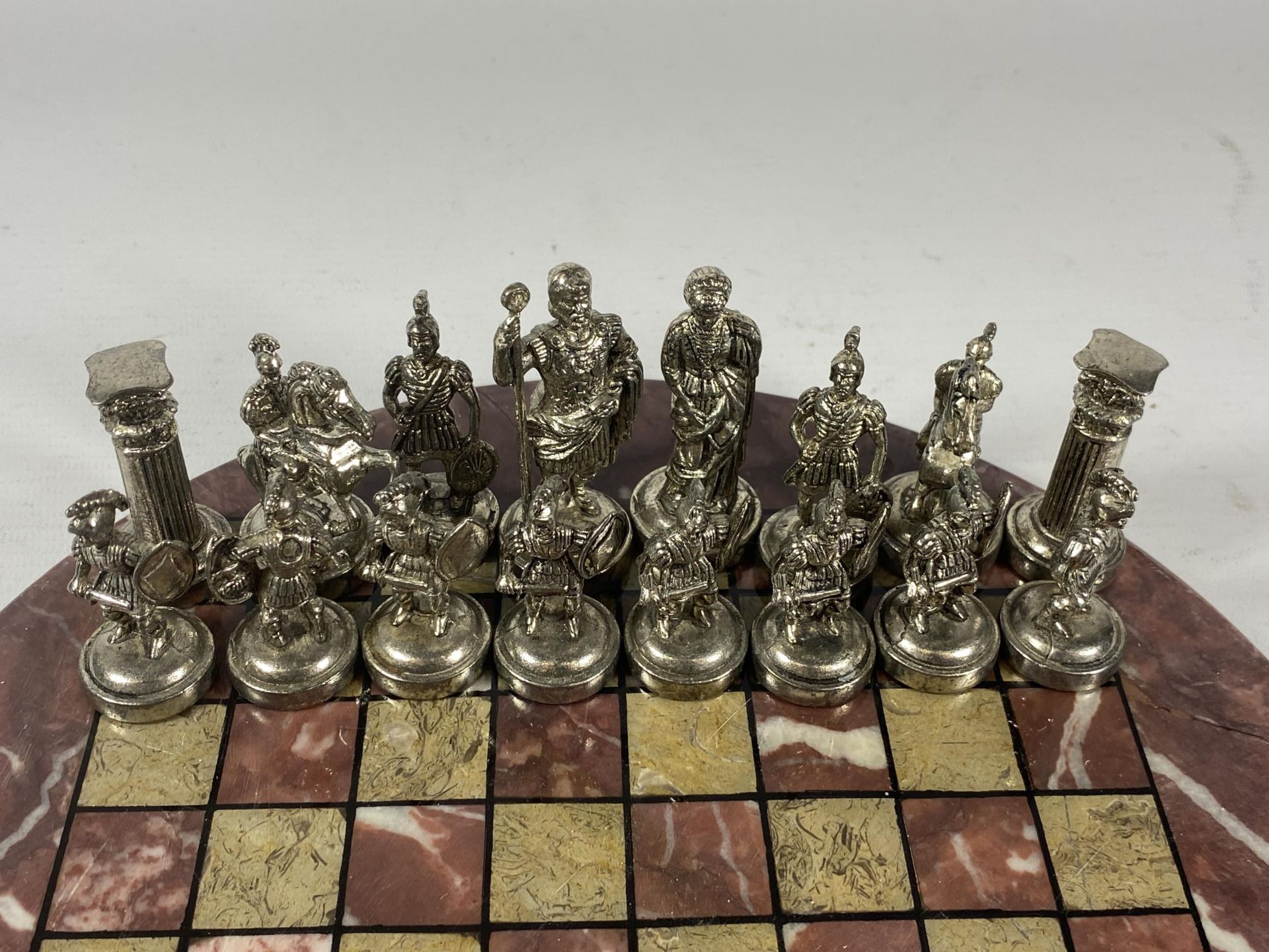 A METAL WARRIOR CHESS SET ON MARBLE BASE, BOARD DIAMETER 26CM - Image 2 of 3