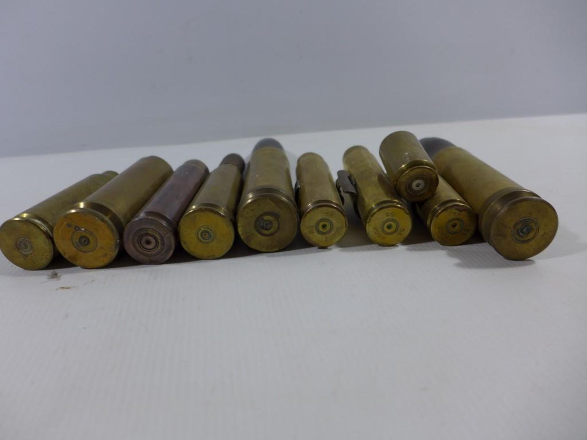 A COLLECTION OF TEN ASSORTED SHELL CASE, HEIGHTS RANGE FROM 4 TO 19CM - Image 2 of 4