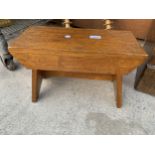 A SMALL WOODEN OAK STOOL