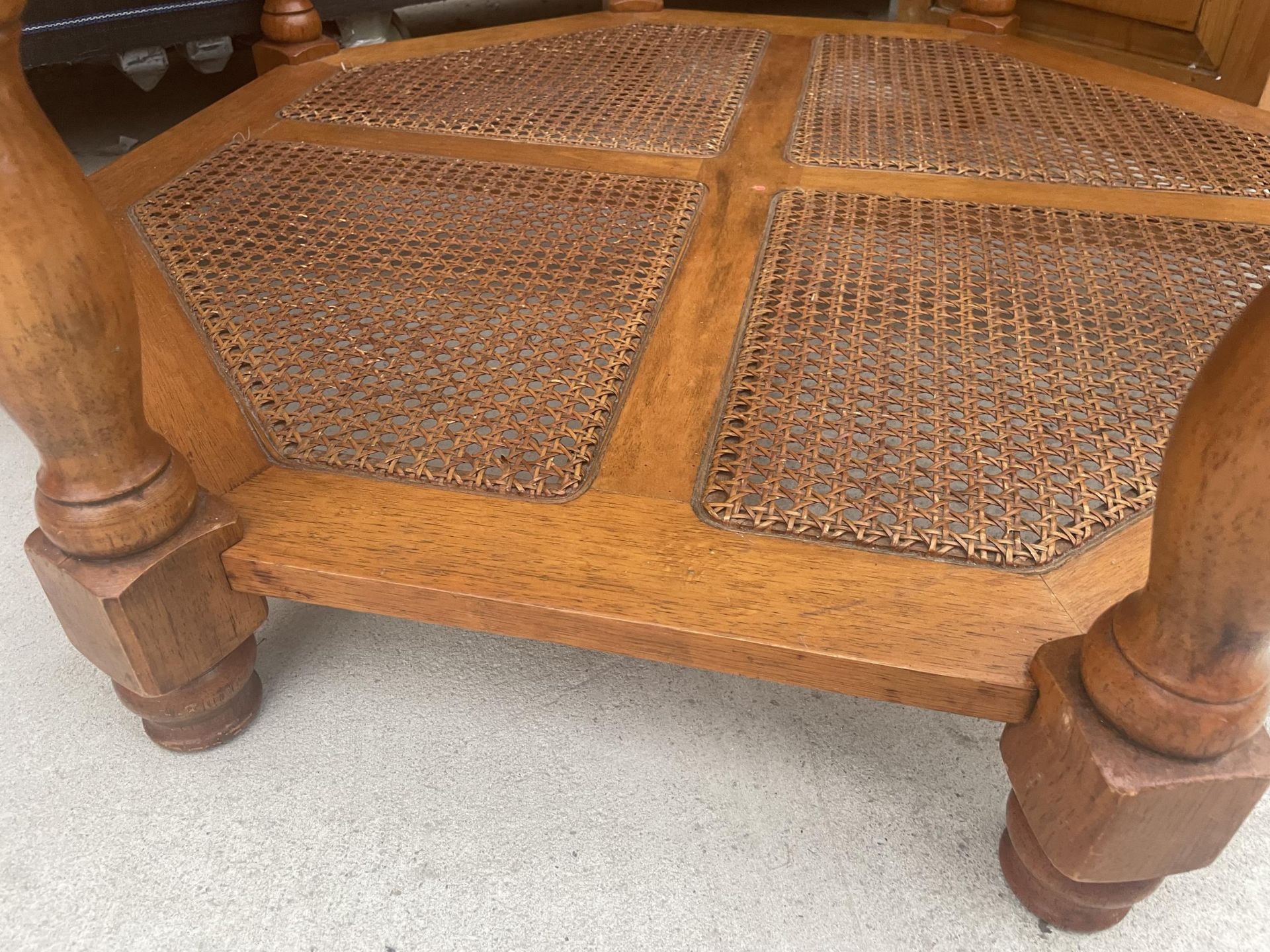 A MODERN OCTAGANOL TWO TIER COFFEE TABLE WITH INSET GLASS TOP AND CANE UNDER TIER 40" ACROSS - Image 3 of 3