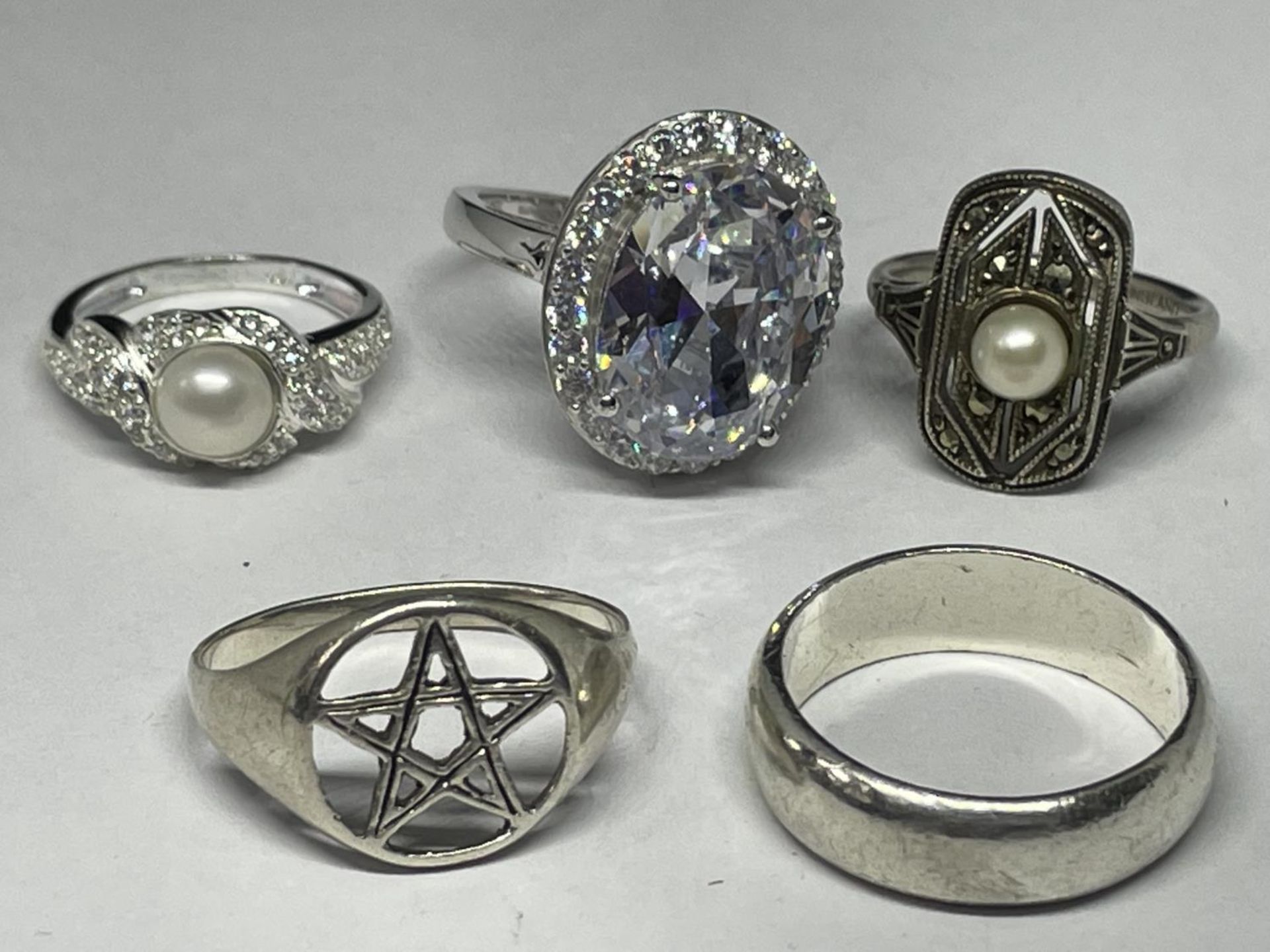 FIVE VARIOUS SILVER RINGS