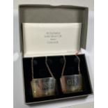 A BOXED PAIR OF HALLMARKED SILVER CONCORDE 'WHISKY' & 'GIN' DECANTER LABELS