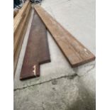 A LENGTH OF IROKO TIMBER (L:14FT 2" W:12" T:2.5") AND A FURTHER PIECE OF MAHOGANY (L:10FT 6" W:16"