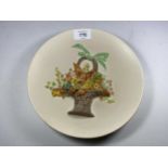 A CLARICE CLIFF POTTERY PLATE WITH BASKET OF FLOWER RELIEF MOULDED DESIGN