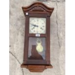 A LINCOLN 31 DAY MECHANICAL WALL CLOCK
