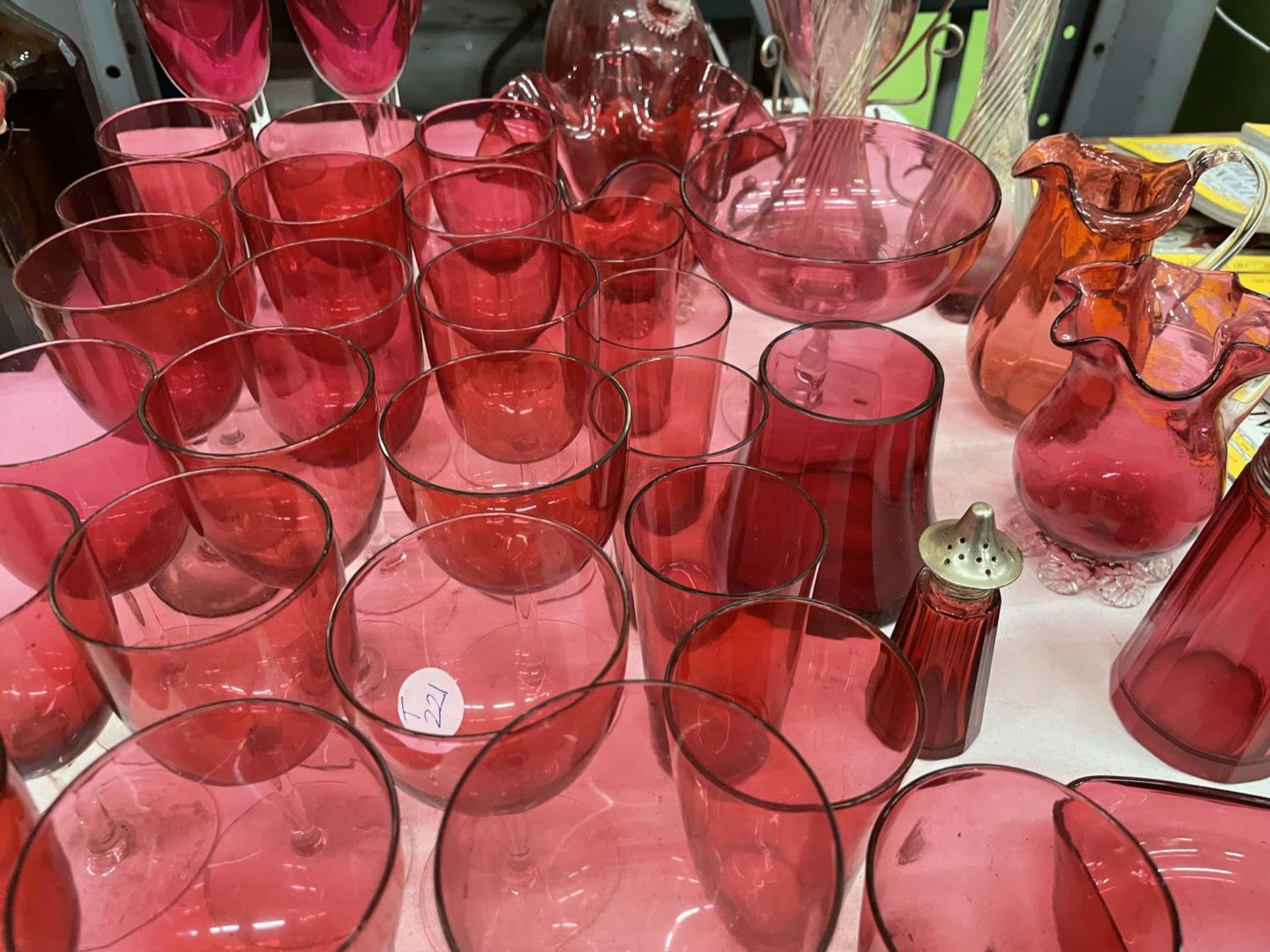 A LARGE QUANTITY OF CRANBERRY GLASS TO INCLUDE DRINKING GLASSES, VASES, JUGS, DECANTER, ETC., - Image 3 of 4