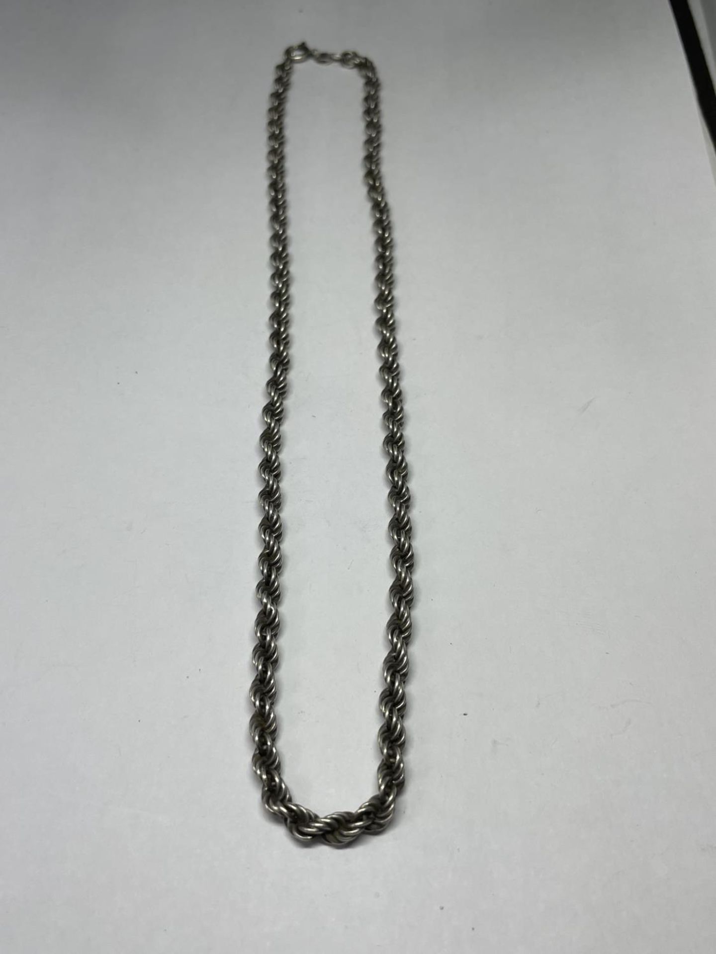 A MARKED SILVER ROPE NECKLACE LENGTH 18 INCHES