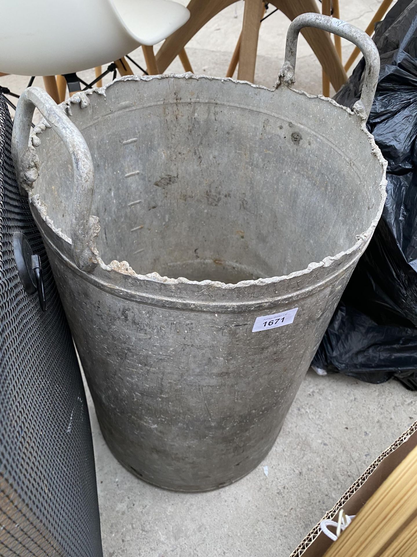 A VINTAGE GALVANISED TWIN HANDLED BIN