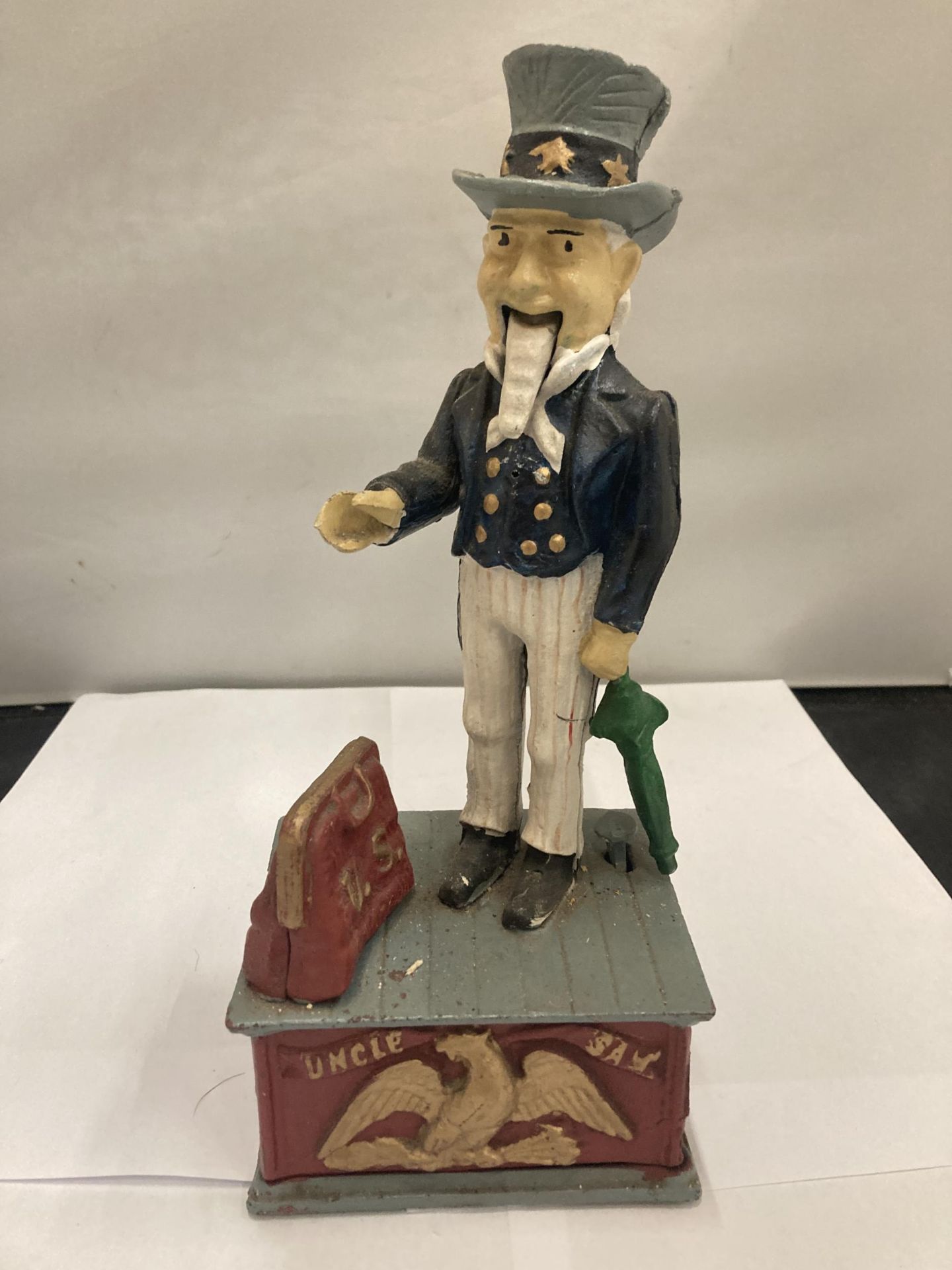 A CAST VINTAGE STYLE 'UNCLE SAM' MONEY BANK