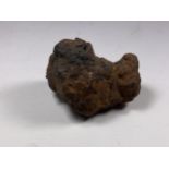 A BELIEVED METEORITE STONE, LENGTH 8CM