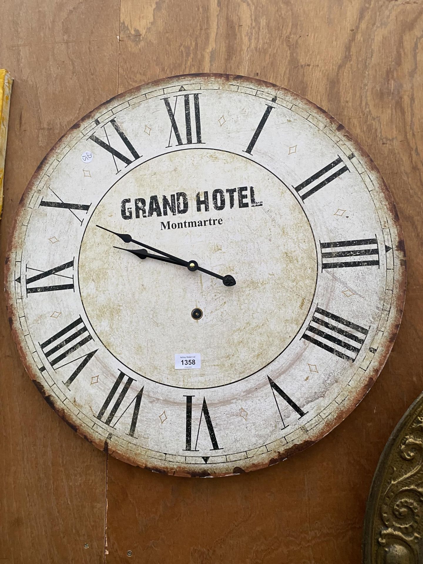 A MODERN GRAND HOTEL WALL CLOCK