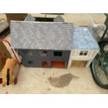 TWO DOLLS HOUSES AND A PUSH ALONG HORSE