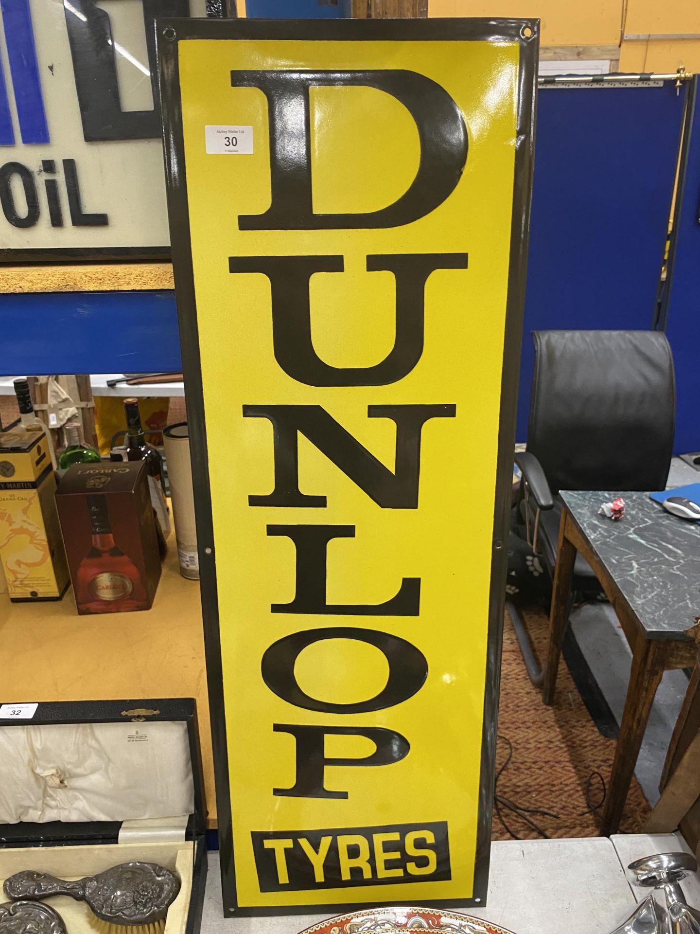 A LARGE DUNLOP TYRES ENAMEL SIGN, 91 X 31CM