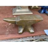 A MINITURE BRASS SAMPLE ANVIL STAMPED D. BRADBURY