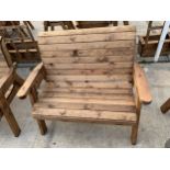 AN EX DISPLAY CHARLES TAYLOR TWO SEATER GARDEN BENCH *PLEASE NOTE VAT TO BE CHARGED ON THIS ITEM*