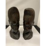 A PAIR OF CARVED HARDWOOD AFRICAN STYLE BUSTS HEIGHT 25CM