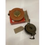 A VINTAGE LEATHER TAPE MEASURE IN ORIGINAL BOX MARKED WEST GERMANY PLUS A VINTAGE WEIGHING DEVICE