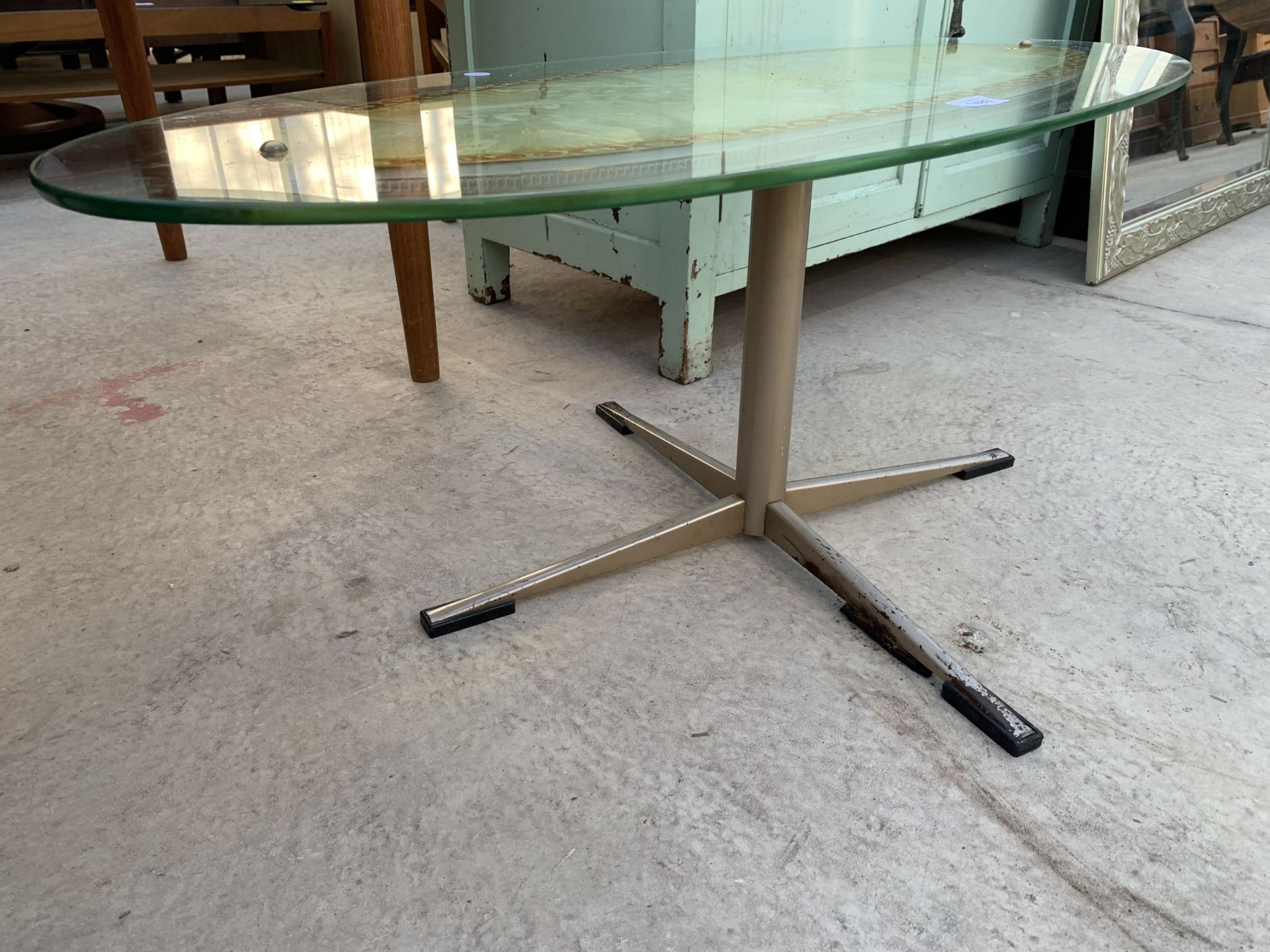 A RETRO 1970'S OVAL GLASS COFFEE TABLE, 38X17", ON ALLOY BASE - Image 3 of 3