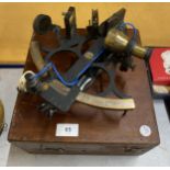 A VINTAGE HUSUN BRASS SEXTANT IN WOODEN BOX