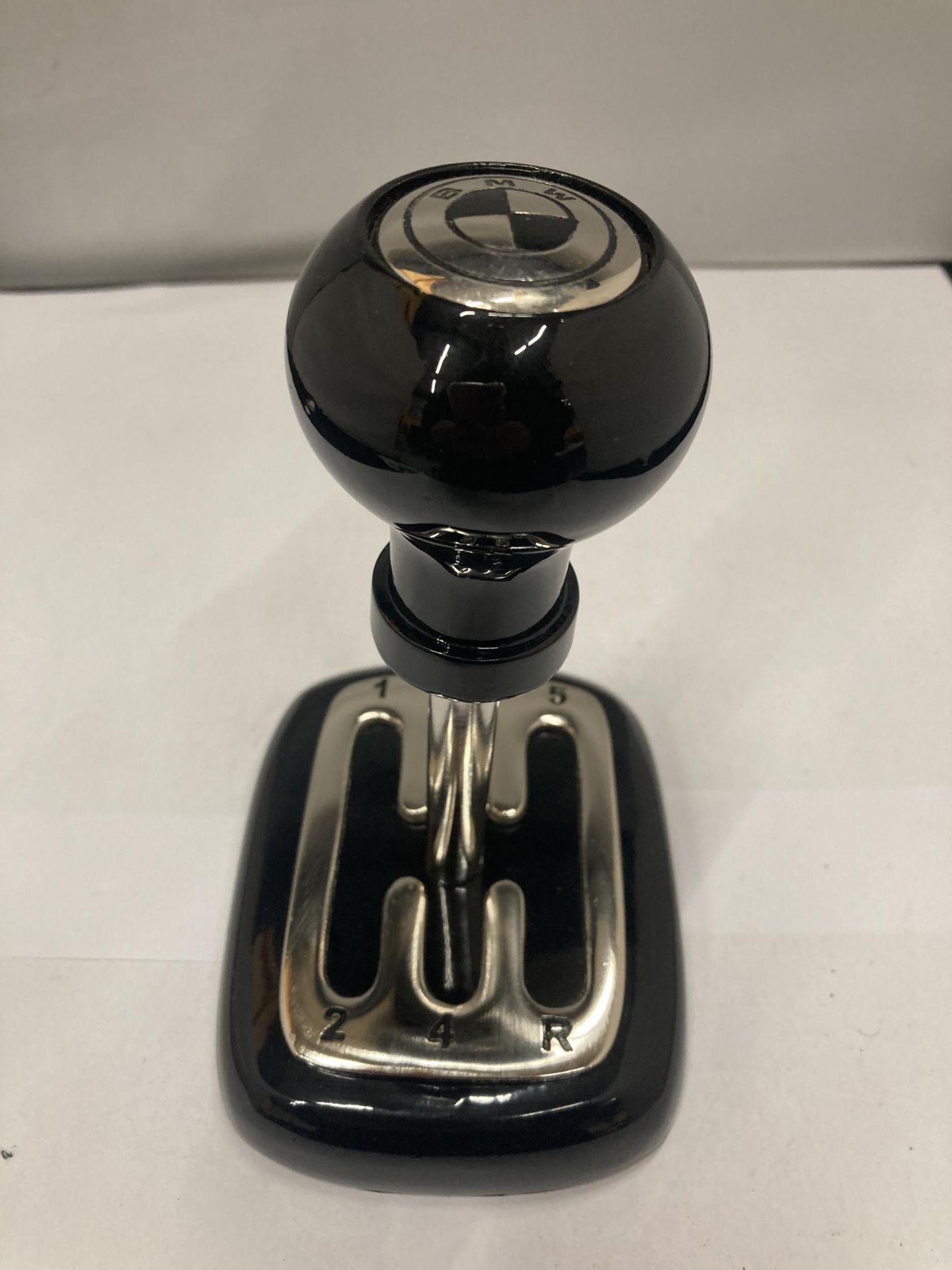 A BMW GEAR STICK ON A BASE HEIGHT 18CM