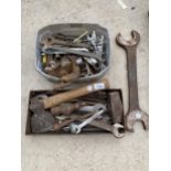 AN ASSORTMENT OF VINTAGE TOOLS TO INCLUDE SPANNERS AND AN AXE ETC