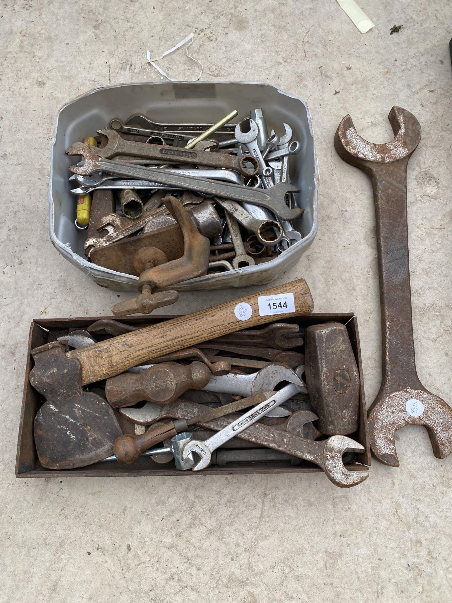 AN ASSORTMENT OF VINTAGE TOOLS TO INCLUDE SPANNERS AND AN AXE ETC