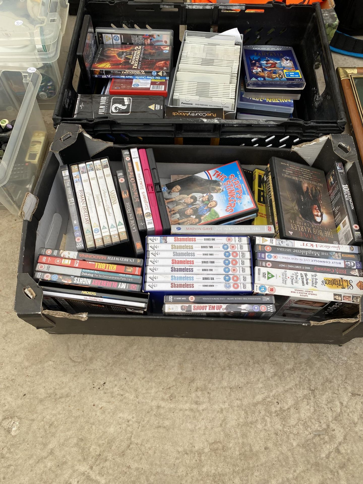 AN ASSORTMENT OF DVDS AND CDS ETC