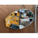 A TWELVE SIDED ART DECO UNFRAMED BEVELED EDGE WALL MIRROR