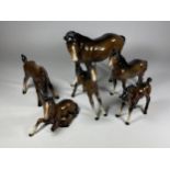 A GROUP OF FIVE BESWICK BROWN GLOSS HORSE MODELS AND FURTHER GERMAN HORSE MODEL, SOME A/F