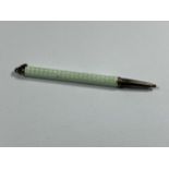 A STERLING SILVER & PALE GREEN ENAMEL PROPELLING PENCIL