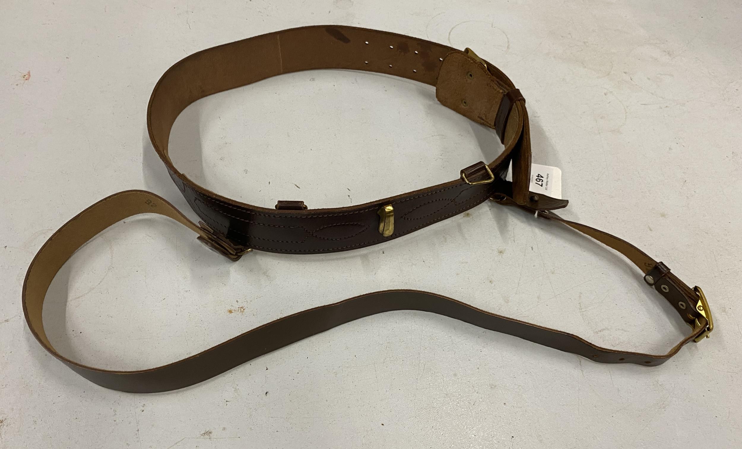 A LEATHER SAM BROWNE BELT AND SHOULDER STRAP