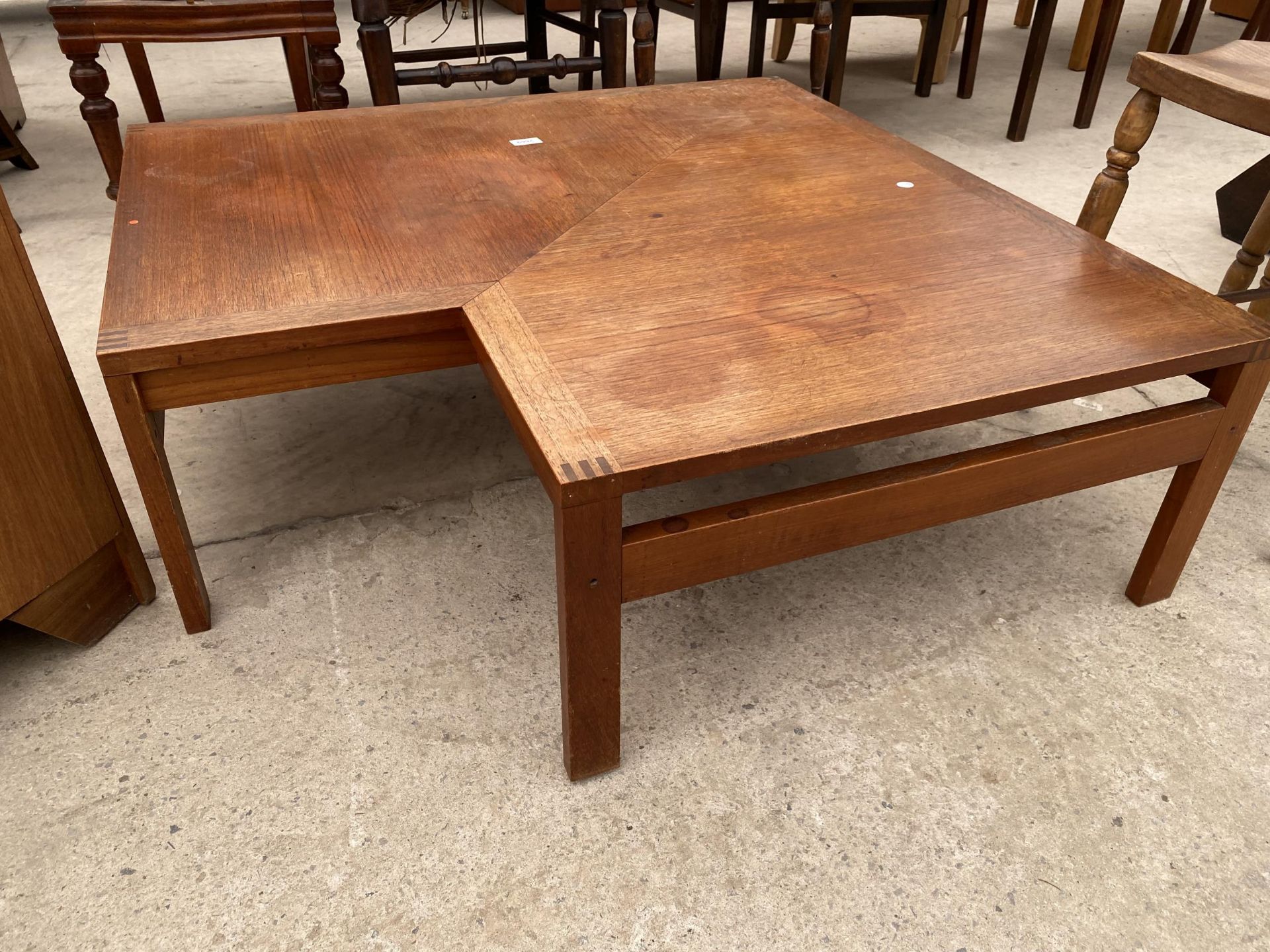 A RETRO TEAK F.F.CAFFRANCE COFFEE TABLE, 37.5" SQUARE, WITH STEPPED CORNER SECTION