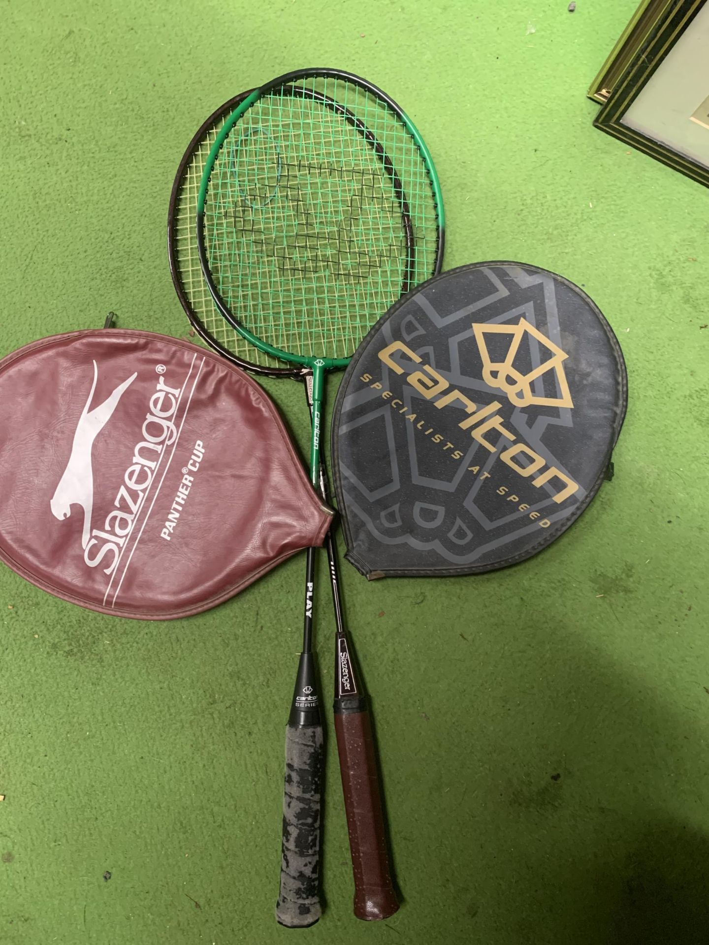 TWO BADMINTON RAQUETS WITH COVERS