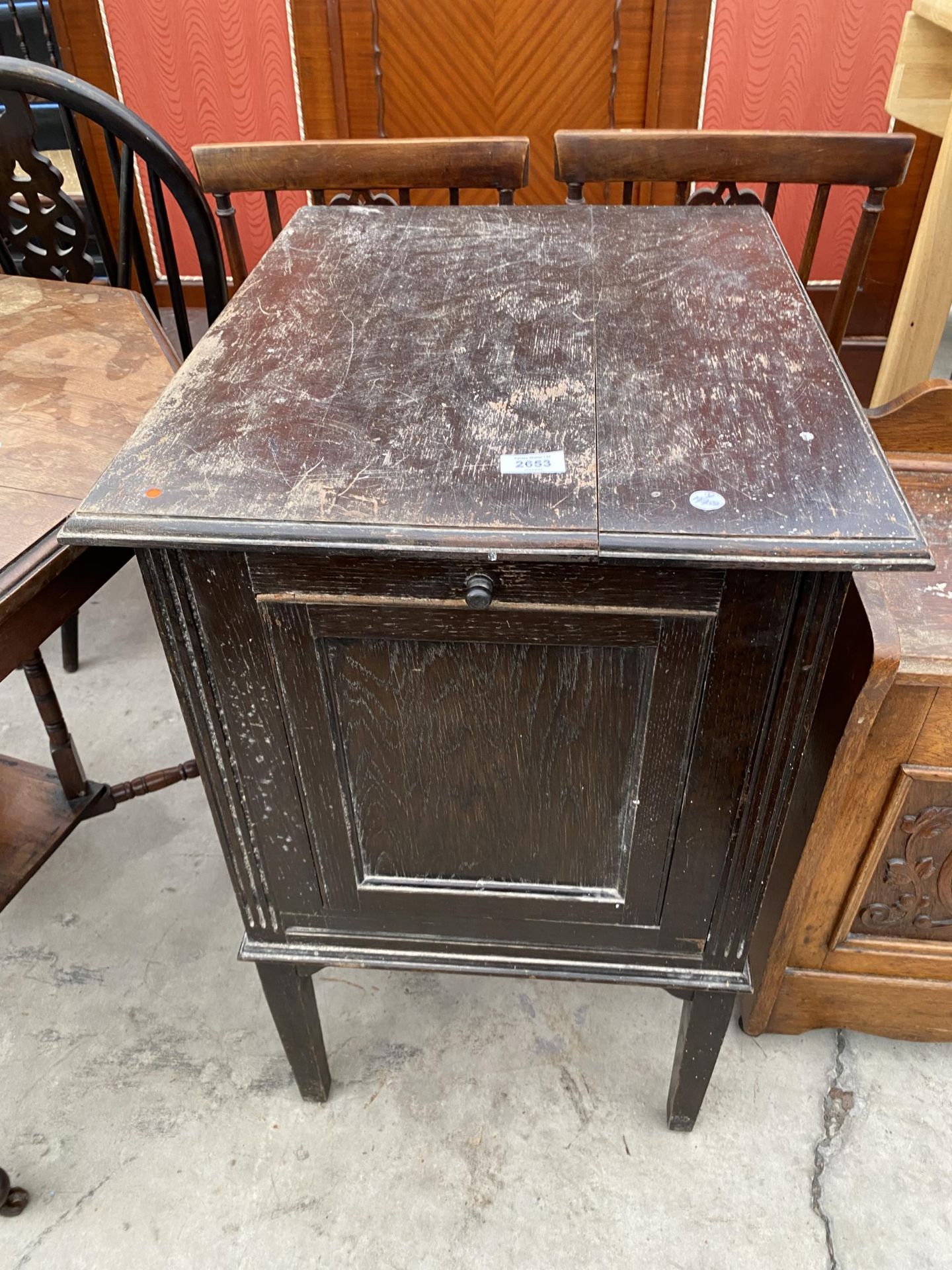 AN OAK 'BARKINGSIDE, EAST-LIGHT' FILING CABINET