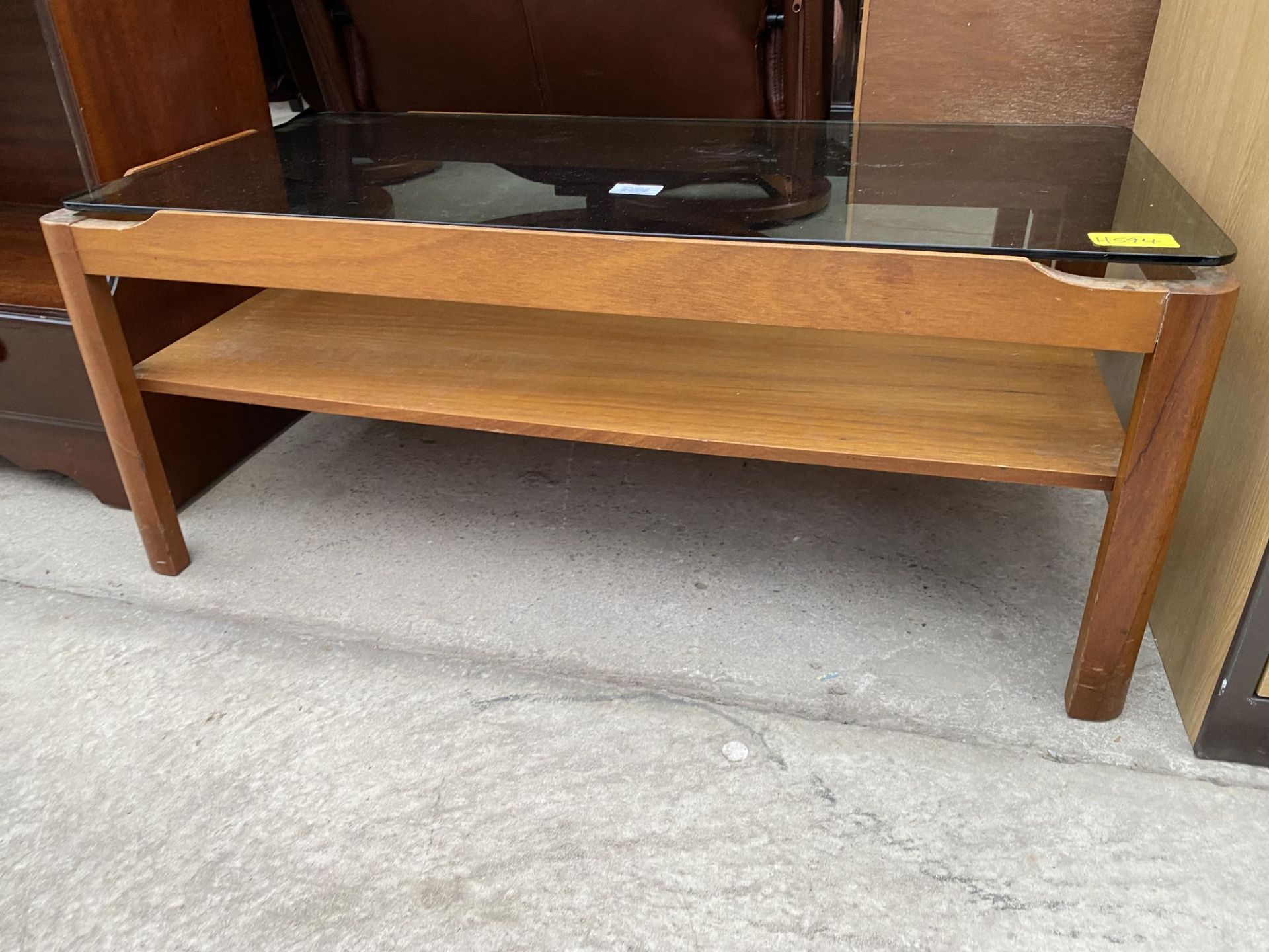 A RETRO TEAK TWO TIER COFFEE TABLE WITH SMOKED GLASS TOP, 34X17" - Image 2 of 2