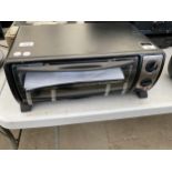 AN ELECTRIC COUNTER TOP TOASTER OVEN