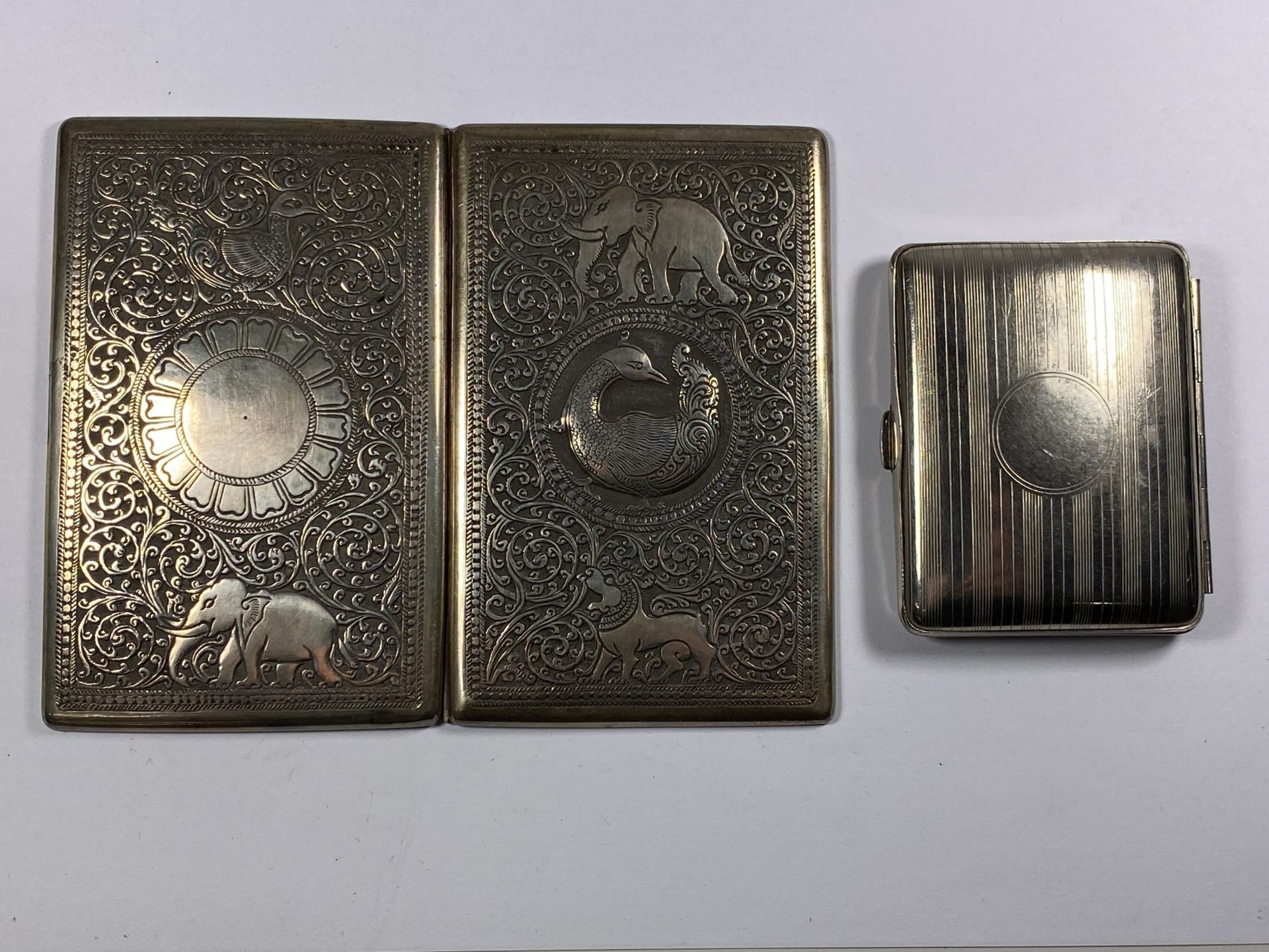 TWO VINTAGE CIGARETTE CASES TO INCLUDE MIDDLE EASTERN DESIGN EXAMPLE
